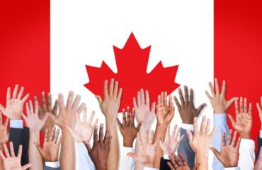 Canadian Flag with thumbs up | Long Mangalji LLP
